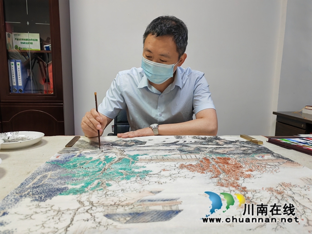 馮廣在創(chuàng)作（曾佐然攝）.jpg